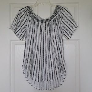 Off the shoulder short sleeve shirt.